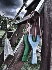 Close-up of boat hanging on wood