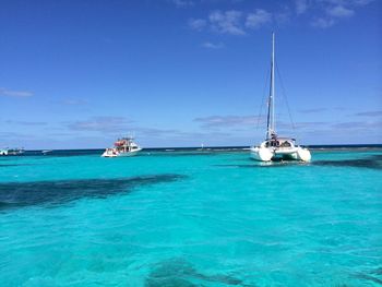 Boats sailing in sea