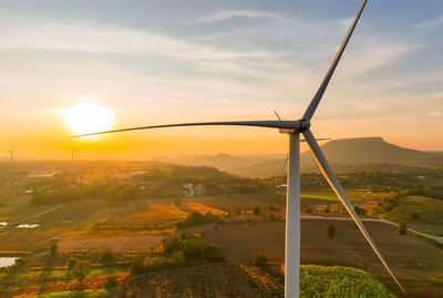 Scenic view of landscape against sky during sunset