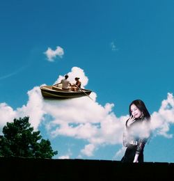 Woman standing against sky