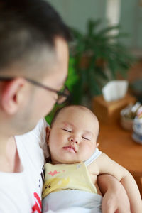 Close-up of father with baby girl