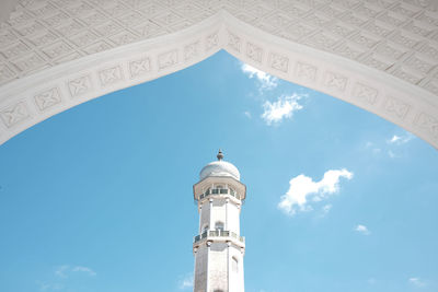 Low angle view of historical mosque building against sky