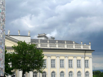 View of building against cloudy sky