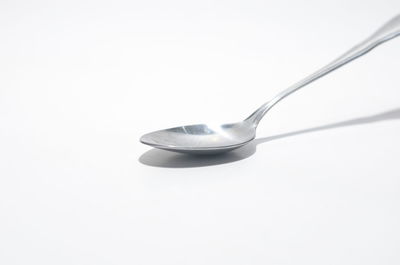 Close-up of electric lamp against white background