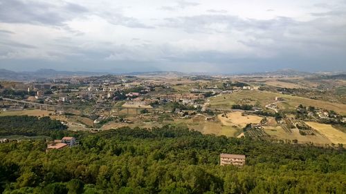 Aerial view of agricultural field against sky