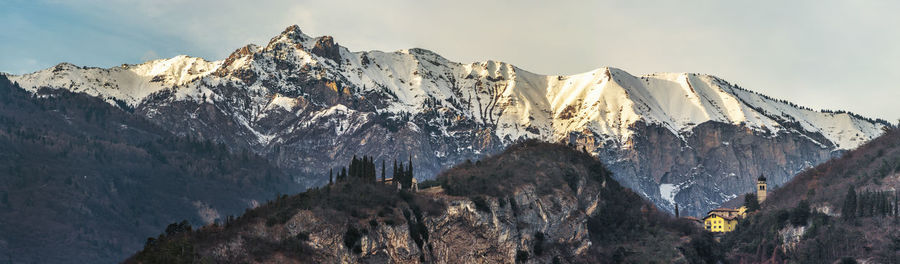 Panoramic view of snowcapped mountains against sky