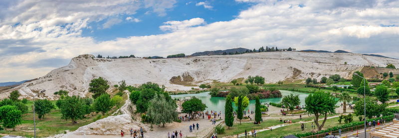 Panoramic view of landscape against cloudy sky