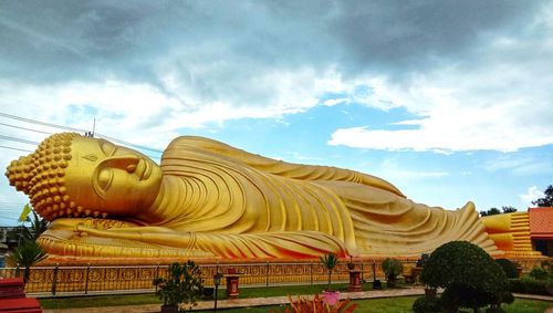 Statue of temple against sky