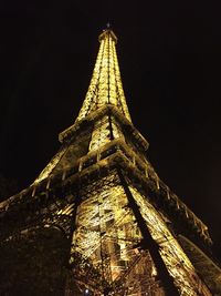 Low angle view of illuminated temple against sky at night