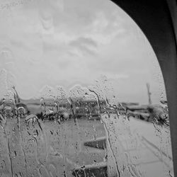 Water drops on glass window of rainy season