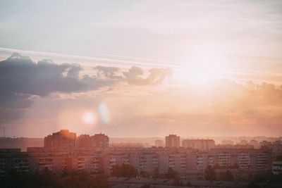 High angle view of buildings against sky during sunset