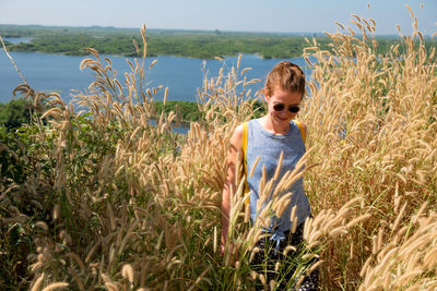 Woman standing in pond