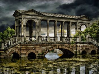 Built structure against cloudy sky