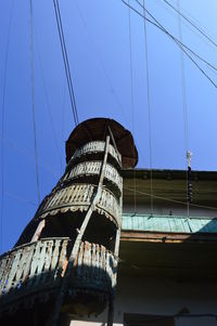 Low angle view of built structure against blue sky