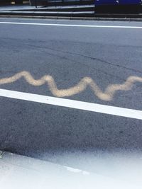 High angle view of shadow on road