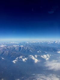 High angle view of mountain against blue sky