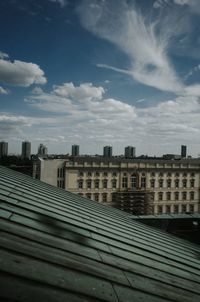 Low angle view of buildings against blue sky