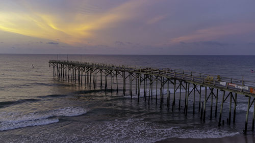 Scenic view of sea against sky at sunset