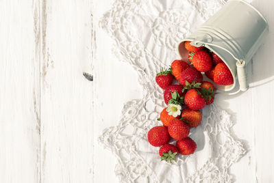 High angle view of strawberries on table