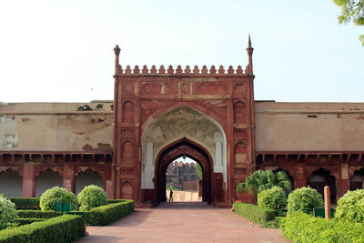 Entrance of historic building against clear sky