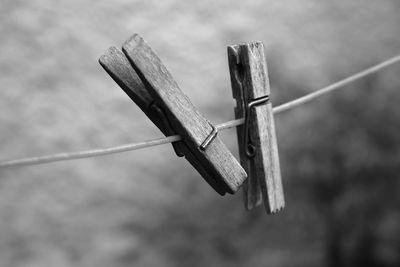 Close-up of clothes hanging on rope