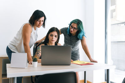 Young business women working in a coworking office