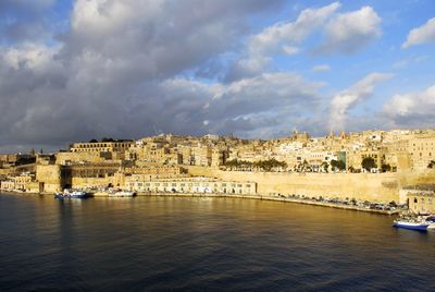 View of river with buildings in background