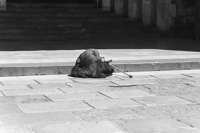 Woman sitting on steps