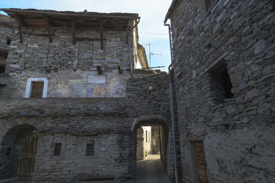 Low angle view of old building against sky