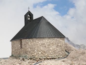 Low angle view of old building against sky