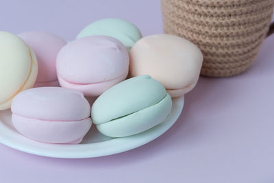 Close-up of multi colored eggs on table