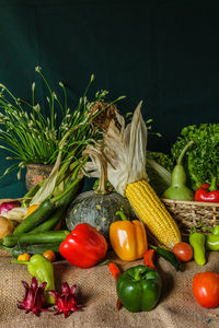 Still life vegetables, herbs and fruit as ingredients in cooking.