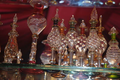 Close-up of glass candles on table