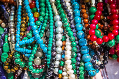 Close-up of multi colored jewelry for sale