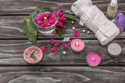 Close-up of flowers on wooden table