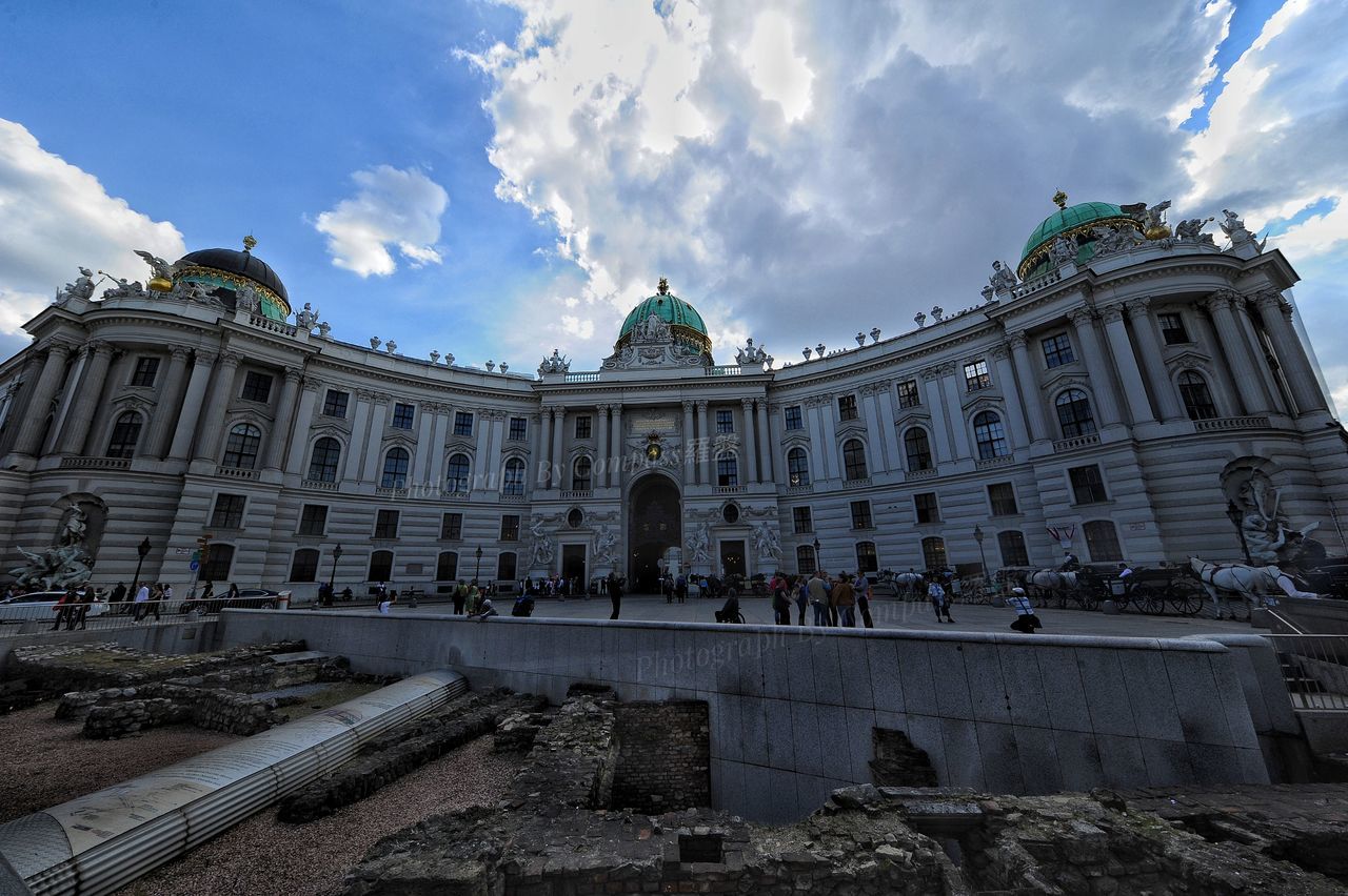 sky, cloud - sky, architecture, built structure, building exterior, travel destinations, history, low angle view, day, outdoors, statue, real people, large group of people, people