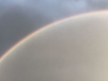 Low angle view of rainbow against sky