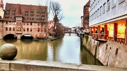 View of canal in city