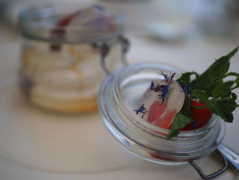 High angle view of fruit on glass table