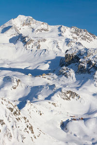 View of snow covered mountain, glacier de bellecote, la plagne ski resort in french savoy alps