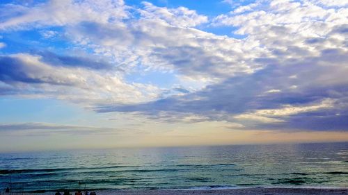 Scenic view of sea against sky at sunset