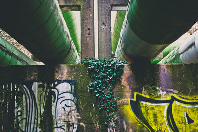 High angle view of graffiti on metal structure