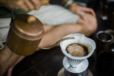 High angle view of coffee cup on table