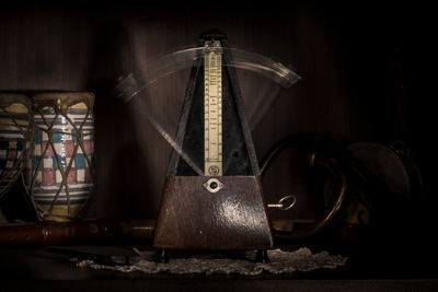 Close-up of old machine part on wall