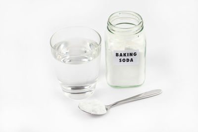 Close-up of wine glass against white background