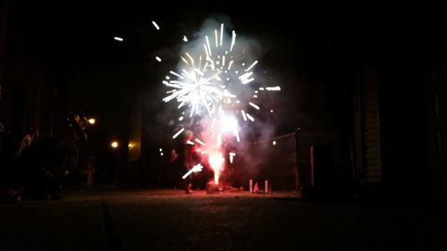 Firework display at night