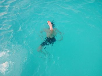 High angle view of person in swimming pool