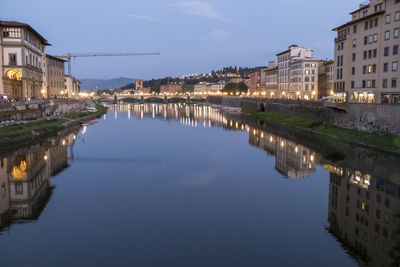 Arno river illuminated at night