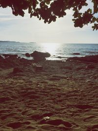 Scenic view of sea against sky at sunset