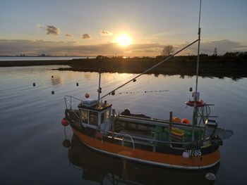 Small fishing boats moored at stone creek inlet, sunk island, east yorkshire, uk